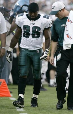 PHILADELPHIA - SEPTEMBER 21: Brian Westbrook #36 of the Philadelphia Eagles is escorted by a trainer as he leaves the field with an injury against the Pittsburgh Steelers during the first half on September 21, 2008 at Lincoln Financial Field in Philadelph