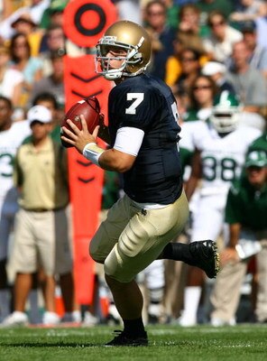 SOUTH BEND, IN - SEPTEMBER 19: Jimmy Clausen #7 of the Notre Dame Fighting Irish looks for a receiver against the Michigan State Spartans on September 19, 2009 at Notre Dame Stadium in South Bend, Indiana. Notre Dame defeated Michigan State 33-30. (Photo 