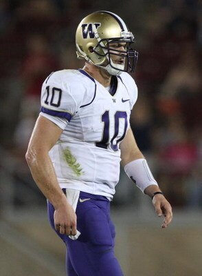 PALO ALTO, CA - SEPTEMBER 26:  Quarterback Jake Locker #10 of the Washington Huskies walks off the field against the Stanford Cardinal at Stanford Stadium on September 26, 2009 in Palo Alto, California.  (Photo by Jed Jacobsohn/Getty Images)
