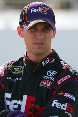 LOUDON, NH - SEPTEMBER 18:  Denny Hamlin, driver of the #11 FedEx Freight Toyota, prepares to drive during qualifying for the NASCAR Sprint Cup Series Sylvania 300 at the New Hampshire Motor Speedway on September 18, 2009 in Loudon, New Hampshire  (Photo 