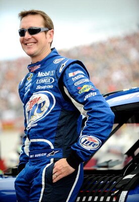 DOVER, DE - SEPTEMBER 27:  Kurt Busch, driver of the #2 Miller Lite Dodge stands by his car during the NASCAR Sprint Cup Series AAA 400 at Dover International Speedway on September 27, 2009 in Dover, Delaware.  (Photo by Jeff Zelevansky/Getty Images for N