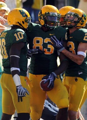 EUGENE, OR - SEPTEMBER 26: Ed Dickson #83 of the Oregon Ducks celebrates his touchdown with his teammates Jeff Maehl #23 and D.J. Davis #10 in the third quarter of the game against the California Bears at Autzen Stadium on September 26, 2009 in Eugene, Or