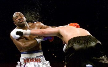 3 Mar 2001:  Evander Holyfield is hit with a left jab by John Ruiz during their WBA heavyweight championship bout at the Mandalay Bay Resort & Casino in Las Vegas, Nevada.  Ruiz won the bout by way of decision after 12 rounds.  <DIGITAL IMAGE> Mandatory C