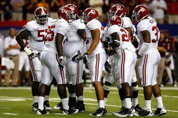 ATLANTA - SEPTEMBER 05:  The Alabama Crimson Tide defense against the Virginia Tech Hokies during the Chick-fil-A Kickoff Game at Georgia Dome on September 5, 2009 in Atlanta, Georgia.  (Photo by Kevin C. Cox/Getty Images)