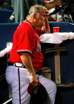 ATLANTA - AUGUST 02:  Manager Bobby Cox # 6 of the Atlanta Braves looks on from the dugout in the ninth inning of their 9-1 loss to the Los Angeles Dodgers on August 2, 2009 at Turner Field in Atlanta, Georgia.  (Photo by Kevin C. Cox/Getty Images)