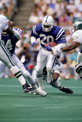1987: Albert Bentley #20 of the Indianapolis Colts looks for room to run against the Philadelphia Eagles during a 1987 NFL game. (Photo by Doug Pensinger/Getty Images)