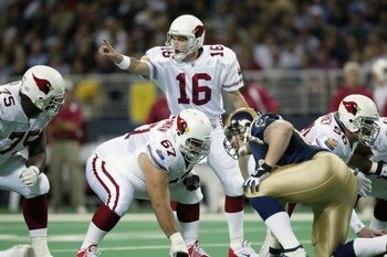 ST. LOUIS, MO - DECEMBER 15:  Quarterback Jake Plummer #16 of the Arizona Cardinals calls out signals against the St. Louis Rams during the NFL game at the Edward Jones Dome on December 15, 2002 in St. Louis, Missouri. The Rams won the game 30-28. (Photo 