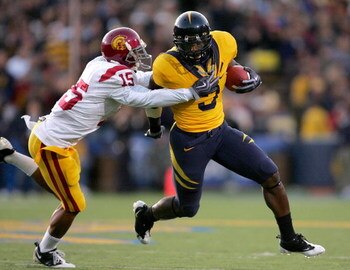 BERKELEY, CA - OCTOBER 03:  Jeremy Ross #3 of the California Golden Bears is tackled by Kevin Thomas #15 of the USC Trojans at California Memorial Stadium on October 3, 2009 in Berkeley, California.  (Photo by Ezra Shaw/Getty Images)