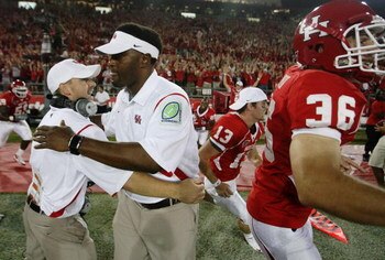 HOUSTON - SEPTEMBER 26:  Head coach Kevin Sumlin of the Houston Cougars is congratulated for defeating  the Texas Tech Red Raiders 29 to 28 at Robertson Stadium on September 26, 2009 in Houston, Texas.  (Photo by Thomas B. Shea/Getty Images)