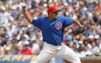 CHICAGO - JULY 03:  Carlos Zambrano #38 of the Chicago Cubs throws a pitch against the Milwaukee Brewers during their MLB game on July 3, 2009 at Wrigley Field in Chicago, Illinois. (Photo by Jonathan Daniel/Getty Images) 