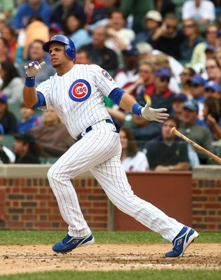 CHICAGO - AUGUST 28: Aramis Ramirez #16 of the Chicago Cubs hits the ball against the New York Mets on August 28, 2009 at Wrigley Field in Chicago, Illinois. The Cubs defeated the Mets 5-2. (Photo by Jonathan Daniel/Getty Images)