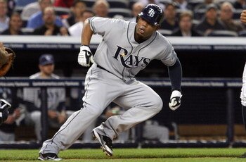 NEW YORK - SEPTEMBER 08:  Carl Crawford #13 of the Tampa Bay Rays is caught in a first inning rundown against the New York Yankees on September 8, 2009 at Yankee Stadium in the Bronx borough of New York City.  (Photo by Jim McIsaac/Getty Images)