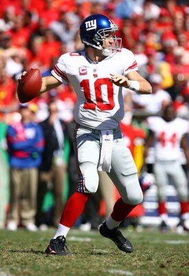 KANSAS CITY, MO - OCTOBER 04:  Quarterback Eli Manning #10 of the New York Giants passes during the game against the Kansas City Chiefs on October 4, 2009 at Arrowhead Stadium in Kansas City, Missouri.  (Photo by Jamie Squire/Getty Images)
