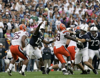 STATE COLLEGE, PA - SEPTEMBER 12: Quarterback Daryll Clark #17 of the Penn State Nittany Lions throws a pass against the Syracuse Orangemen during the first half against the Penn State Nittany Lions at Beaver Stadium September 12, 2009 in State College,