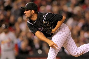DENVER - SEPTEMBER 25:  Relief pitcher Huston Street #16 of the Colorado Rockies delivers against the St. Louis Cardinals at Coors Field on September 25, 2009 in Denver, Colorado. Street earned the win as the Rockies defeated the Cardinals 2-1.  (Photo by