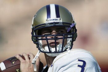 LOS ANGELES - OCTOBER 19:  Cody Pickett #3 of the Washington Huskies warms up before the Pac-10 Conference football game against the USC Trojans at the Los Angeles Coliseum on October 19,  2002 in Los Angeles, California.  USC won 41-21.  (Photo by Stephe
