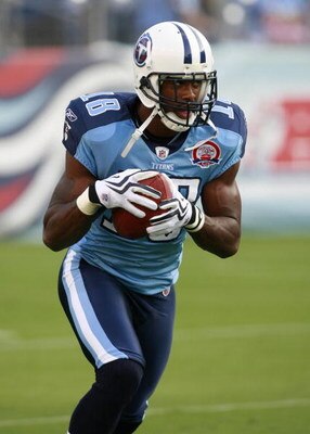 NASHVILLE, TN - SEPTEMBER 3: Kenny Britt #18 of the Tennessee Titans runs with the ball in warmups against the Green Bay Packers during a preseason NFL game at LP Field on September 3, 2009 in Nashville, Tennessee. The Titans beat the Packers 27-13. (Phot