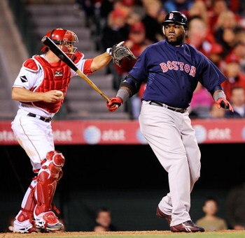 ANAHEIM, CA - APRIL 10: David Ortiz #34 of the Boston Red Sox strikes out as  catcher Jeff Mathis #5 the Los Angeles Angels reacts during the eight inning at Angel Stadium April 10, 2009 in Anaheim, California. Angels won, 6-3.  (Photo by Kevork Djansezia