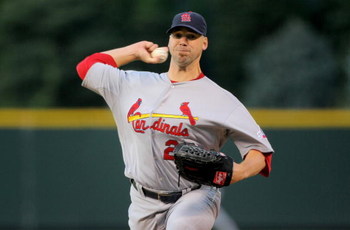 DENVER - SEPTEMBER 25:  Starting pitcher Chris Carpenter #29 of the St. Louis Cardinals delivers against the Colorado Rockies at Coors Field on September 25, 2009 in Denver, Colorado. The Rockies defeated the Cardinals 2-1.  (Photo by Doug Pensinger/Getty