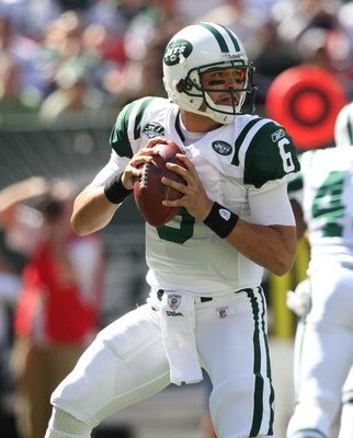 EAST RUTHERFORD, NJ - SEPTEMBER 20:  Mark Sanchez #6 of the New York Jets drops back to pass against the New England Patriots at Giants Stadium on September 20, 2009 in East Rutherford, New Jersey.  (Photo by Nick Laham/Getty Images)