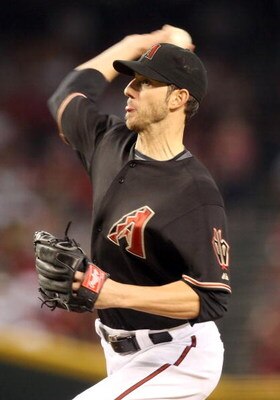 PHOENIX - AUGUST 29:  Starting pitcher Jon Garland #52 of the Arizona Diamondbacks pitches against the Houston Astros during the major league baseball game at Chase Field on August 29, 2009 in Phoenix, Arizona.  The Diamondbacks defeated the Astros 9-0.  