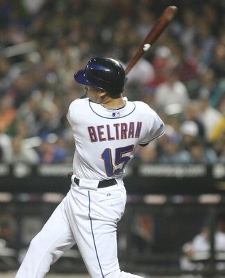 NEW YORK - JUNE 11:  Carlos Beltran #15 of the New York Mets at bat against the Philadelphia Phillies on June 11, 2009 at Citi Field in the Flushing neighborhood of the Queens borough of New York City.  (Photo by Nick Laham/Getty Images)