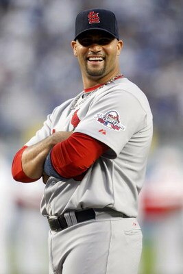 LOS ANGELES, CA - OCTOBER 07:  Albert Pujols #5 of the St. Louis Cardinals smiles during pregame introductions before taking on the Los Angeles Dodgers in Game One of the NLDS during the 2009 MLB Playoffs at Dodger Stadium on October 7, 2009 in Los Angele