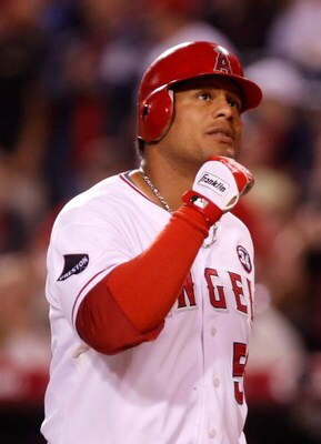 ANAHEIM, CA - SEPTEMBER 29:  Bobby Abreu #53 of the Los Angeles Angels of Anaheim pumps his fist after hitting a solo home run in the first inning against the Texas Rangers at Angel Stadium on September 29, 2009 in Anaheim, California. The Angels defeated
