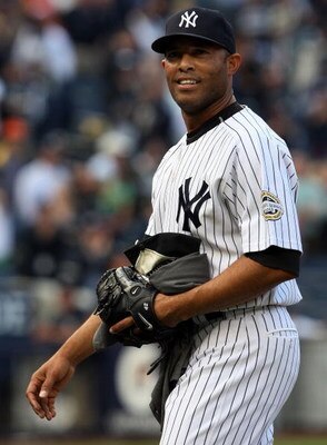 NEW YORK - SEPTEMBER 27:  Mariano Rivera #42 of the New York Yankees celebrates after his team defeated the Boston Red Sox on September 27, 2009 at Yankee Stadium in the Bronx borough of New York City. The Yankees won the game 4-2 to earn their 100th win 