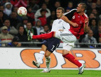 LONDON - AUGUST 22: Christian Pander of Germany takes the ball from David Beckham of England during the international friendly match between England and Germany at Wembley stadium on August 22, 2007 in London, England.  (Photo by Martin Rose/Bongarts/Gett