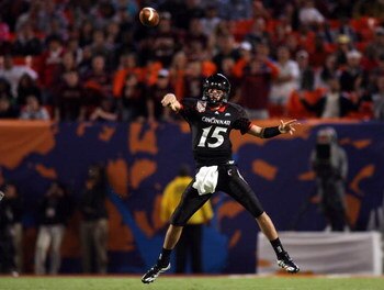 MIAMI - JANUARY 01:  Tony Pike #15 of the Cincinnati Bearcats passes against the Virginia Tech Hokies during the FedEx Orange Bowl at Dolphin Stadium on January 1, 2009 in Miami, Florida.  (Photo by Marc Serota/Getty Images)