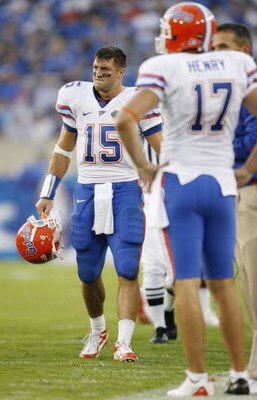LEXINGTON, KY - SEPTEMBER 26: Quarterback Tim Tebow #15 of the Florida Gators walks on the sidelines near punter Chas Henry #17 during the second quarter of the game against the Kentucky Wildcats at Commonwealth Stadium on September 26, 2009 in Lexington,