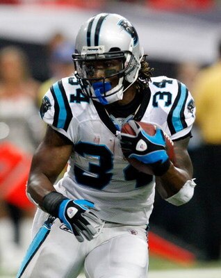 ATLANTA - SEPTEMBER 20:  DeAngelo Williams #34 of the Carolina Panthers is slow to get up against the Atlanta Falcons at Georgia Dome on September 20, 2009 in Atlanta, Georgia.  (Photo by Kevin C. Cox/Getty Images)
