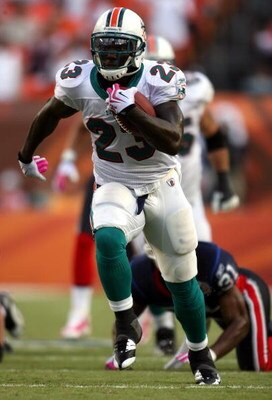 MIAMI - OCTOBER 04:  Running back Ronnie Brown #23 of the Miami Dolphins runs against the Buffalo Bills at Land Shark Stadium on October 4, 2009 in Miami, Florida. Miami defeated Buffalo 31-30.  (Photo by Marc Serota/Getty Images)