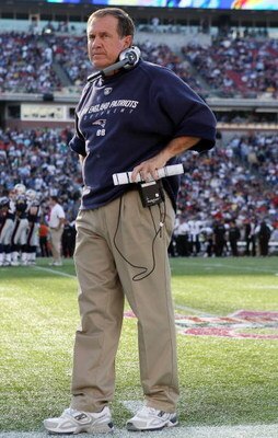 FOXBORO, MA - OCTOBER 04:  Head coach Bill Belichick of the New England Patriots waits for play review in the second half against the Baltimore Ravens on October 4, 2009 at Gillette Stadium in Foxboro, Massachusetts. The Patriots defeated the Ravens 27-21