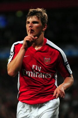 LONDON, ENGLAND - SEPTEMBER 29:  Andrey Arshavin of Arsenal celebrates scoring the second goal during the UEFA Champions League Group H match between Arsenal and Olympiakos at the Emirates Stadium on September 29, 2009 in London, England.  (Photo by Mike 