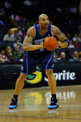 CHARLOTTE, NC - NOVEMBER 14:  Carlos Boozer #5 of the Utah Jazz looks to pass during the game against the Charlotte Bobcats on November 14, 2008 at Time Warner Cable Arena in Charlotte, North Carolina.  The Bobcats won 104-96.  NOTE TO USER: User expressl