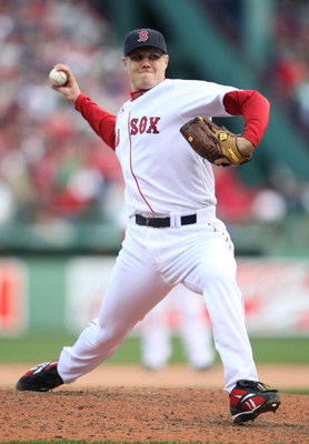 BOSTON - OCTOBER 11: Pitcher Jonathan Papelbon #58 of the Boston Red Sox delivers a pitch against the Los Angeles Angels of Anaheim in the eighth inning of Game Three of the ALDS during the 2009 MLB Playoffs at Fenway Park on October 11, 2009 in Boston,