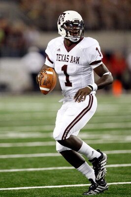 ARLINGTON, TX - OCTOBER 03:  Quarterback Jerrod Johnson #1 of the Texas A&M Aggies drops back to pass against the Arkansas Razorbacks at Cowboys Stadium on October 3, 2009 in Arlington, Texas.  (Photo by Ronald Martinez/Getty Images)