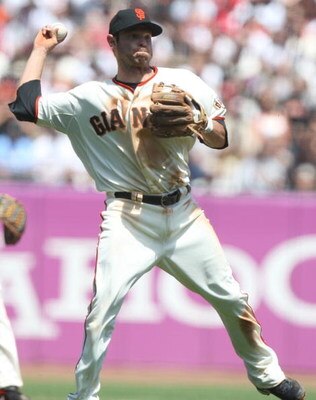 SAN FRANCISCO - AUGUST 02:  Freddy Sanchez #21 of the San Francisco Giants throws to first against the Philadelphia Phillies during a Major League Baseball game at AT&T Park on August 2, 2009 in San Francisco, California.  (Photo by Jed Jacobsohn/Getty Im