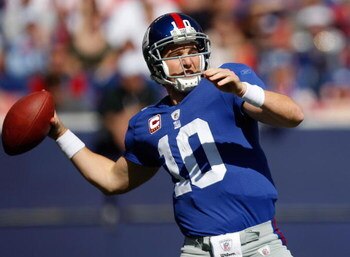 EAST RUTHERFORD, NJ - OCTOBER 11: Eli Manning #10 of the New York Giants drops back to pass against the Oakland Raiders during the game on October 11, 2009 at Giants Stadium in East Rutherford, New Jersey. (Photo by Jared Wickerham/Getty Images)