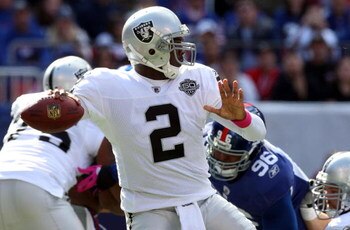 EAST RUTHERFORD, NJ - OCTOBER 11:  JaMarcus Russell #2 of the Oakland Raiders throws a pass against the New York Giants on October 11, 2009 at Giants Stadium in East Rutherford, New Jersey.  (Photo by Jim McIsaac/Getty Images)