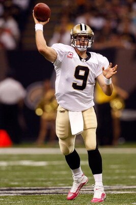 NEW ORLEANS - OCTOBER 04:  Quarterback Drew Brees #9 of the New Orleans Saints throws the ball against the New York Jets at the Louisana Superdome on October 4, 2009 in New Orleans, Louisiana.  (Photo by Chris Graythen/Getty Images)
