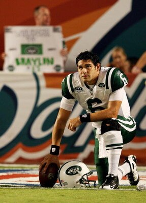 MIAMI - OCTOBER 12:  Quarterback Mark Sanchez #6 of the New York Jets takes a moment on the field during pre-game warm-up before taking on the Miami Dolphins at Land Shark Stadium on October 12, 2009 in Miami, Florida.  (Photo by Doug Benc/Getty Images)