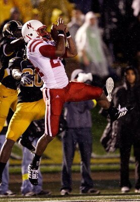 COLUMBIA, MO - OCTOBER 08:  Niles Paul #24 of the Nebraska Cornhuskers catches a pass for a touchdown as Charlie Brockway #20 of the Missouri Tigers defends during the game on October 8, 2009 at Faurot Field/Memorial Stadium in Columbia, Missouri.  (Photo
