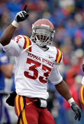 LAWRENCE, KS - OCTOBER 10:  Running back Alexander Robinson #33 of the Iowa State Cyclones celebrates after scoring a touchdown during the game against the Kansas Jayhawks on October 10, 2009 at Memorial Stadium in Lawrence, Kansas.  (Photo by Jamie Squir
