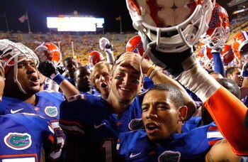 BATON ROUGE, LA - OCTOBER 10:  Quarterback Tim Tebow #15 of the Florida Gators celebrates their 13-3 win over the Louisiana State University Tigers with his teammates at Tiger Stadium on October 10, 2009 in Baton Rouge, Louisiana.  (Photo by Kevin C. Cox/