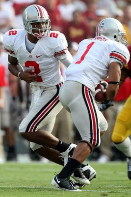 LOS ANGELES, CA - SEPTEMBER 13:  Terrelle Pryor #2 of the Ohio State Buckeyes hands the ball off against the USC Trojans during the college football game at the Los Angeles Memorial Coliseum on September 13, 2008 in Los Angeles, California.  (Photo by Har