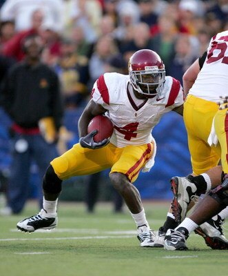 BERKELEY, CA - OCTOBER 03:  Joe McKnight #4 of the USC Trojans runs with the ball during their game against the California Golden Bears at California Memorial Stadium on October 3, 2009 in Berkeley, California.  (Photo by Ezra Shaw/Getty Images)