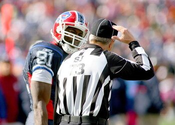 ORCHARD PARK, NY - OCTOBER 11: Terrell Owens #81 of the Buffalo Bills tries to make a case for pass interference with side judge Joe Larew #73 against the Cleveland Browns  at Ralph Wilson Stadium on October 11, 2009 in Orchard Park, New York. Cleveland w